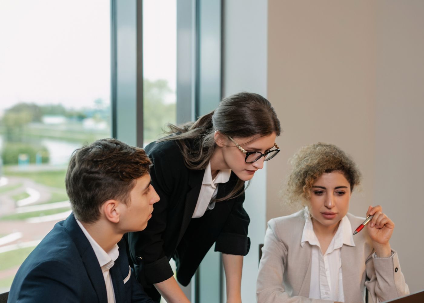 A manager bringing employees up to speed